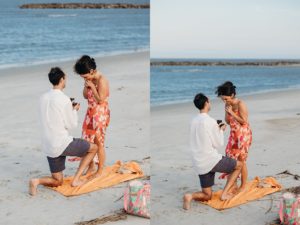 man kneeling down proposing to girlfriend on the beach